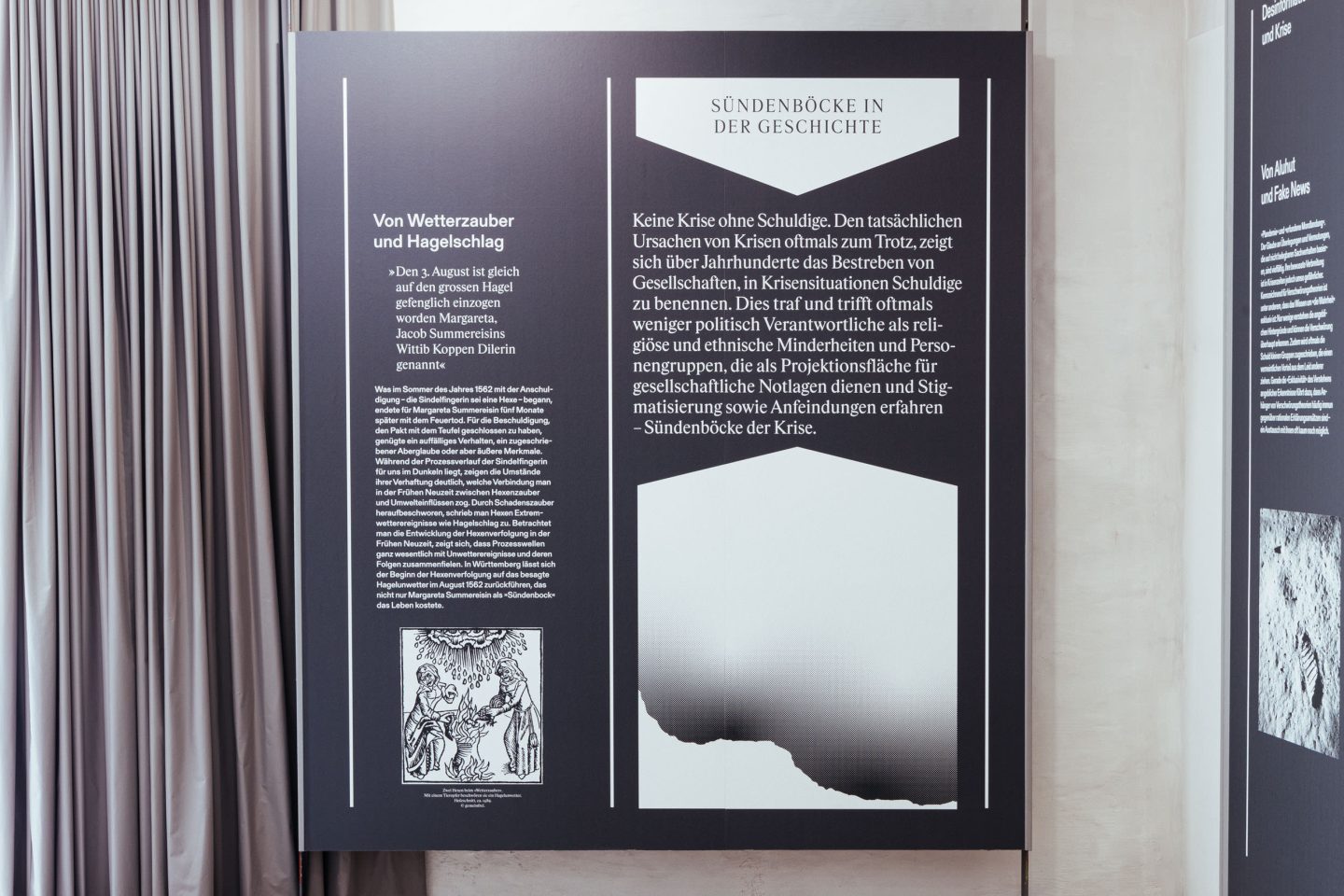 Exhibition wall about scapegoats in times of crisis with historical and contemporary references.