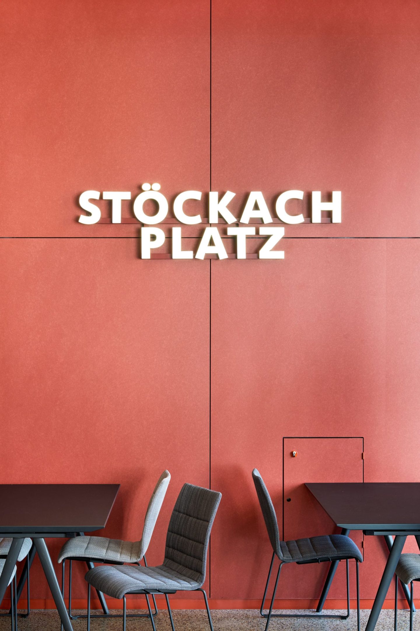 Dimensional wall lettering for VfB Stuttgart at MHP Arena, featuring anodised aluminium profile letters for lodge and hospitality wayfinding.