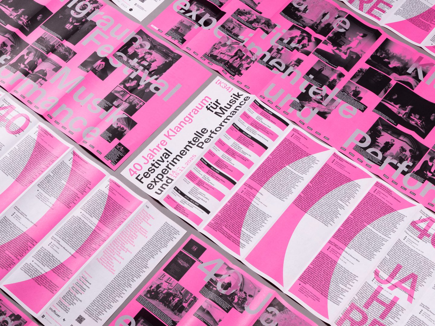 Fold-out programme for the 40th Klangraum festival, printed in bright pink with photographs, schedules, and experimental typography
