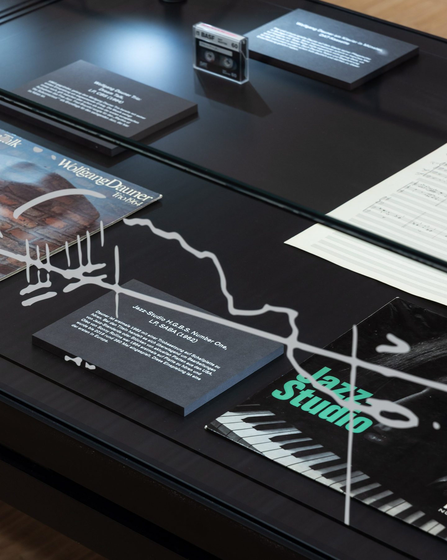 Display design “Jazz et cetera”: tapes and vinyl and music scores show the work of Wolfgang Dauner